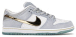 SB Dunk Low Pro X Sean Cliver Holiday Special